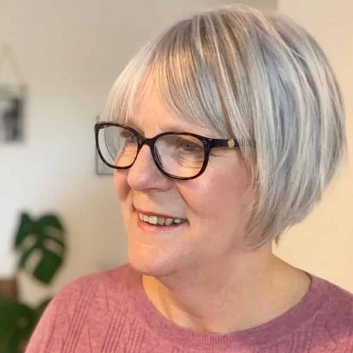 How can I choose a hairstyle that complements my glasses?