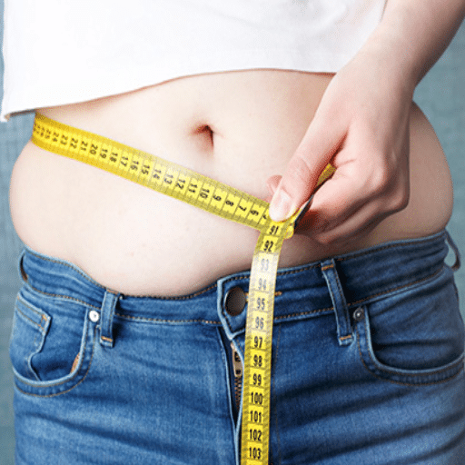 What role does menopause play in weight gain for women over 50?