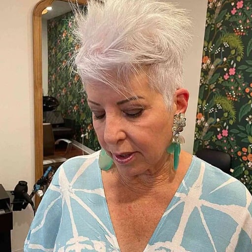 How can I embrace my natural gray hair in my 60s?