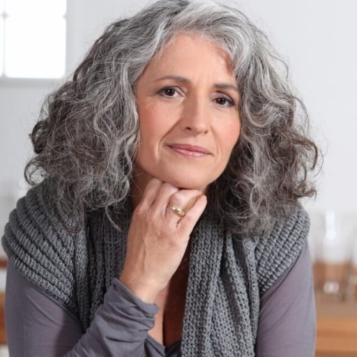 What hairstyles work best for thinning hair in women over 50?