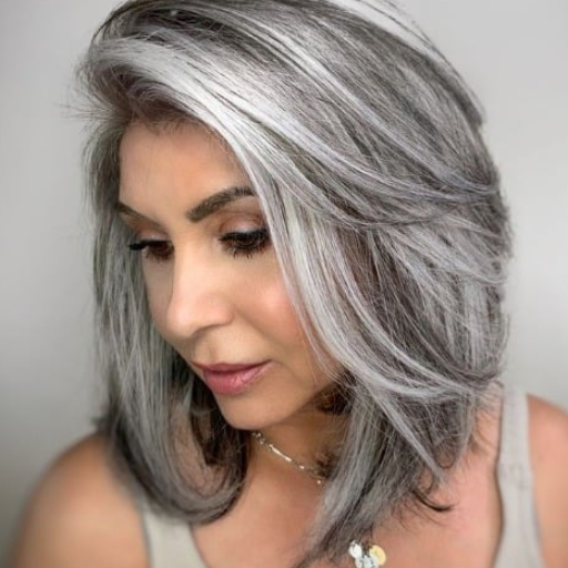 How can a shag haircut enhance grey or silver hair?