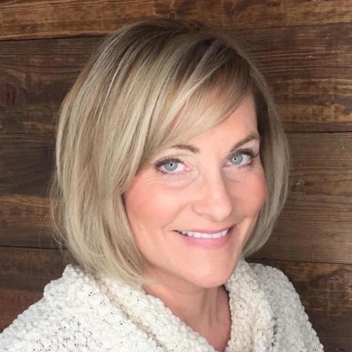 What are low-maintenance medium hairstyles for women over 50?