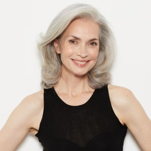 What types of bangs work well for women over 60 with thin, medium-length hair?