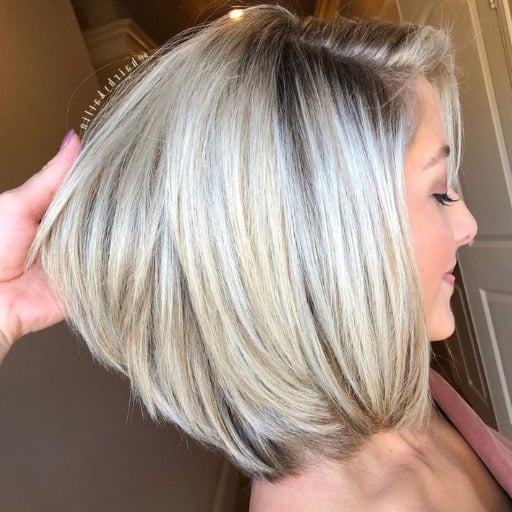 What are low-maintenance medium-length layered hairstyles for over 60 with thin hair?