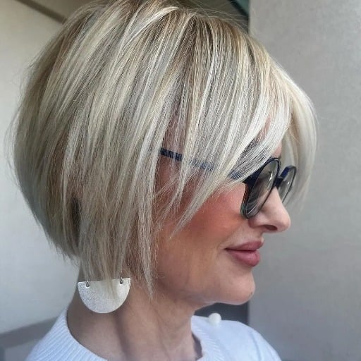 What are the most flattering short hairstyles for women over 50 with thin hair?