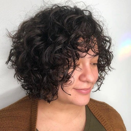 How can hair color help thin hair look thicker after 50?