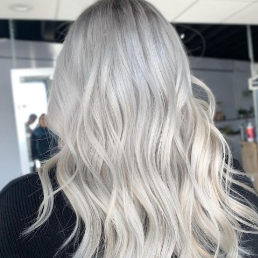 How Can I Embrace My Long Gray Hair Gracefully?