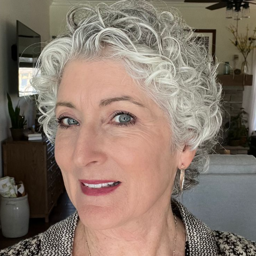 What are some low-maintenance hairstyles for curly hair over 60?