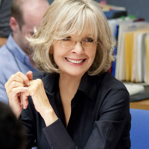 medium length layered hairstyles for over 50 with glasses