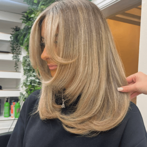 Medium-Length Layered Haircuts with Face-Framing Layers for Thick Hair