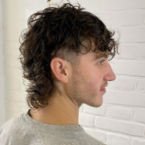 The Wolf Cut: A Textured Hairstyle Blending Mullet and More